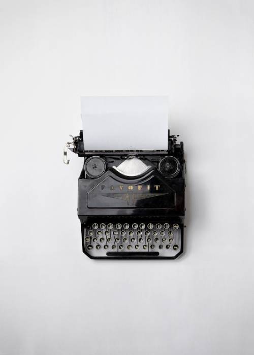 The Weight of Words – Vintage Typewriter
